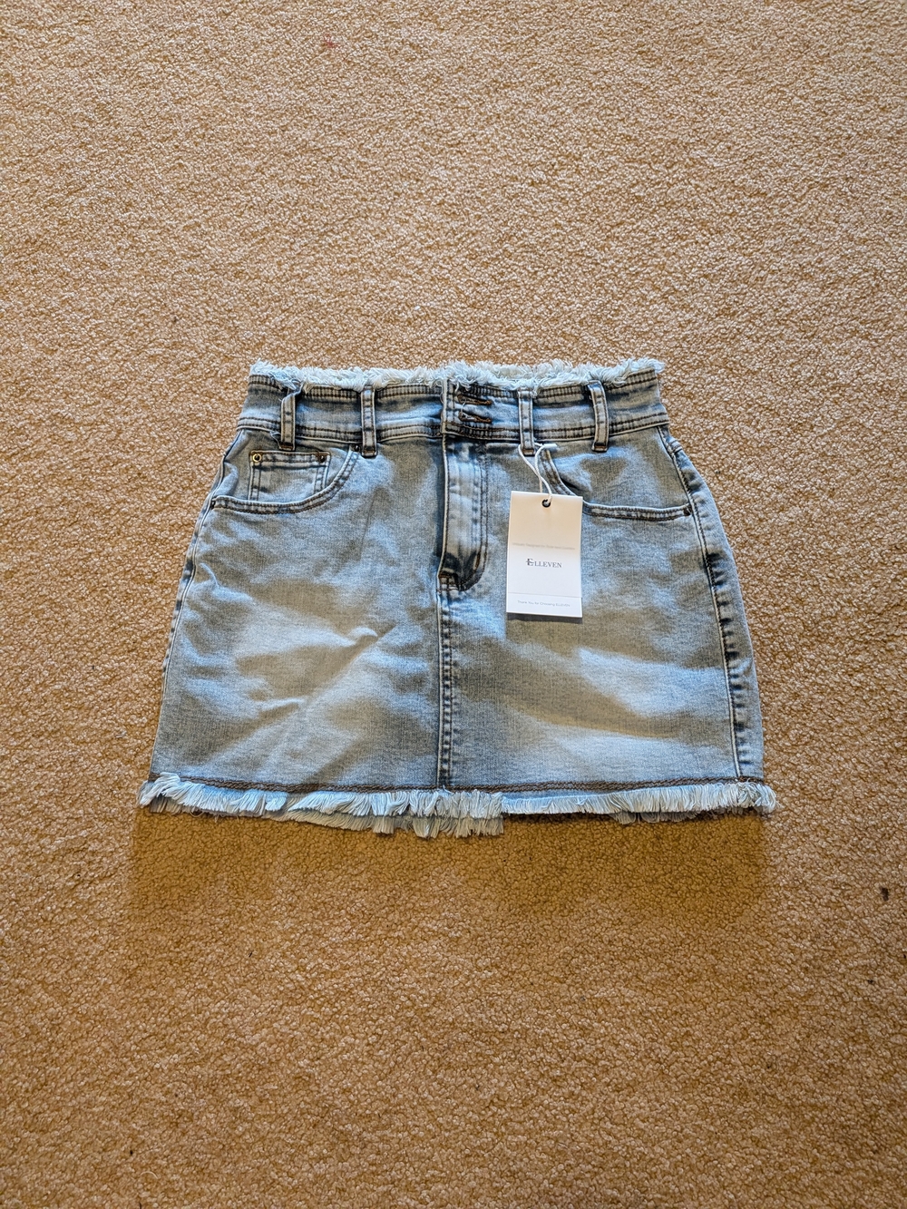Pale Blue Denim Mini Skirt with Frayed Edges